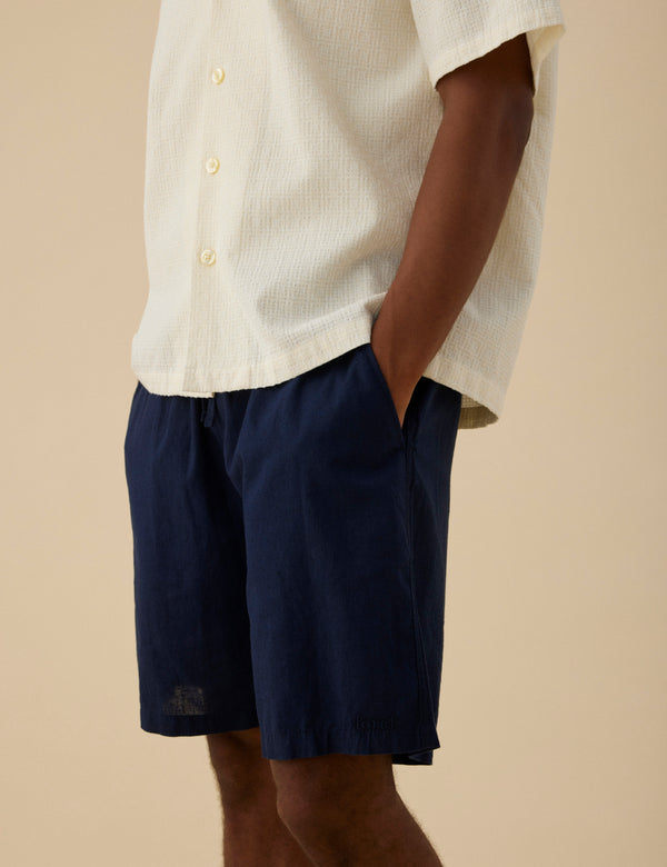 Forét SERENE LINEN SHORTS - NAVY