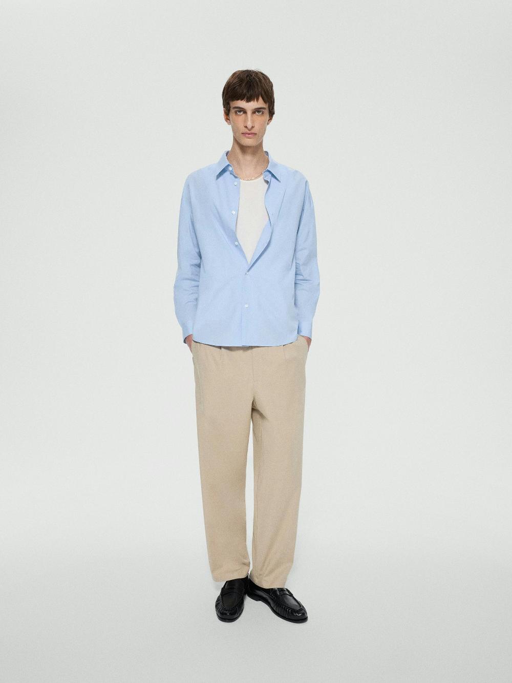 Frame Cotton Relaxed Trousers In Beige