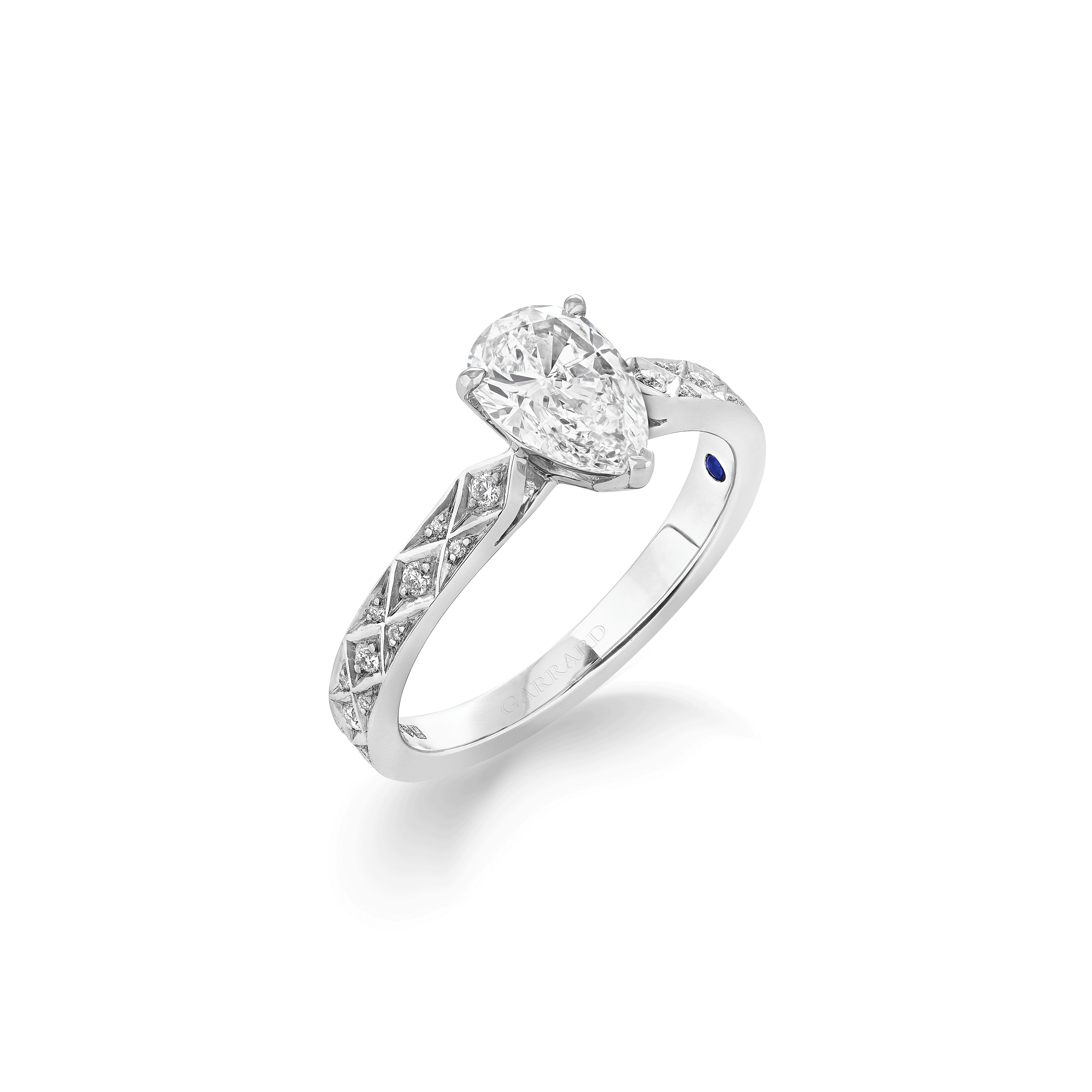 garrard Signature Pear Shape Diamond Solitaire Engagement Ring In Platinum with Diamonds