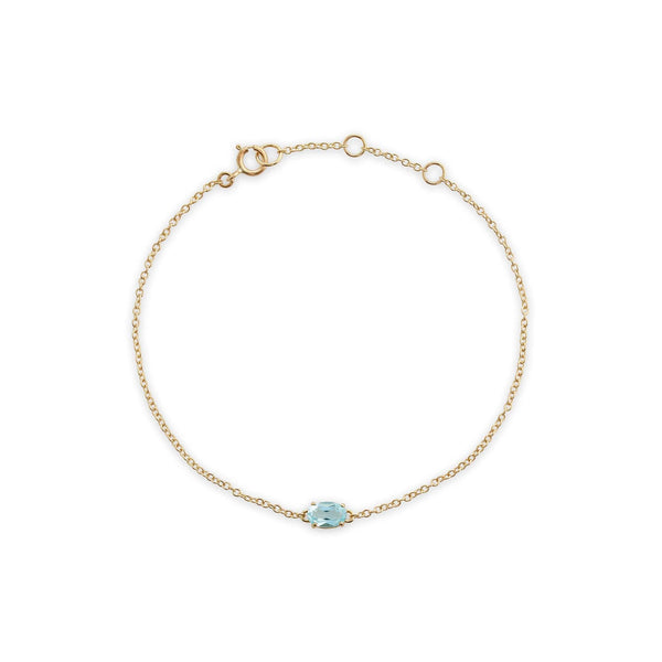 gemondo Classic Oval Blue Topaz Single Stone Bracelet in 9ct Yellow Gold