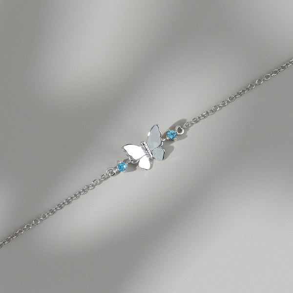 Gemondo Classic Round Blue Topaz Butterfly Bracelet In 9ct White Gold