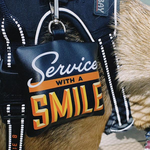 Genuine Fred POOP BAG HOLDER: SERVICE WITH A SMILE Howligans