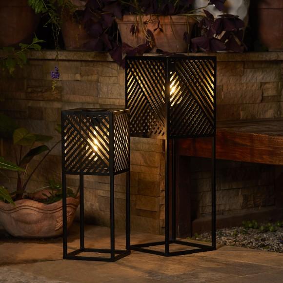 Glitzhome Glitzhome 23.75"H / 17.75"H Set Of 2 Black Metal Stripes Geometric Solar Powered Edison Bulb Outdoor Floor Lantern Or Planter Stands
