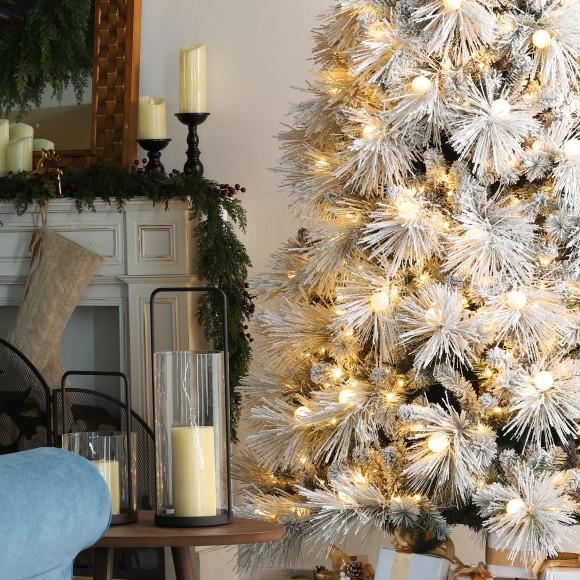 Glitzhome Glitzhome 7.5ft Pre-Lit Flocked Full Pine Artificial Christmas Tree With 650 G40 Warm White Globe LED Lights 3 Function W/Foot Pedal