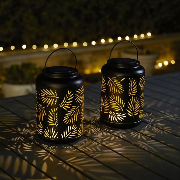 Glitzhome Glitzhome 8.75"H Black Metal Cutout Leaf Solar Powered Outdoor Hanging Lantern With LED Light Set Of 2