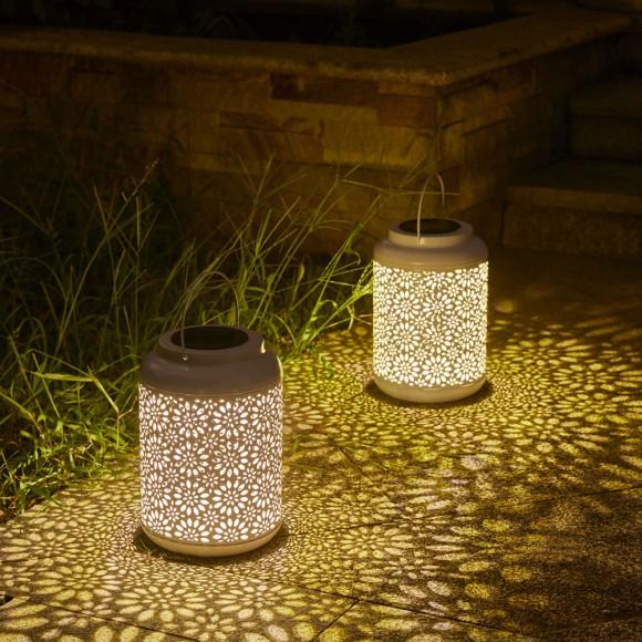 Glitzhome Glitzhome 8.75"H White Metal Cutout Flower Solar Powered Outdoor Hanging Lantern With LED Light Set Of 2
