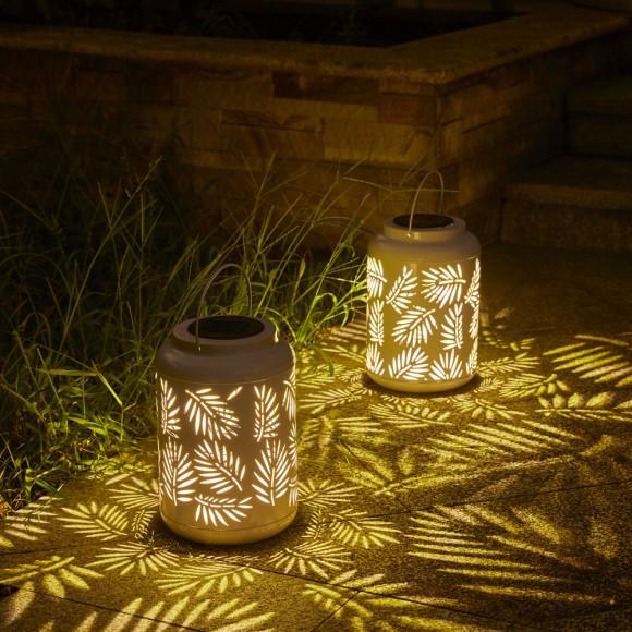 Glitzhome Glitzhome 8.75"H White Metal Cutout Leaf Solar Powered Outdoor Hanging Lantern With LED Light Set Of 2