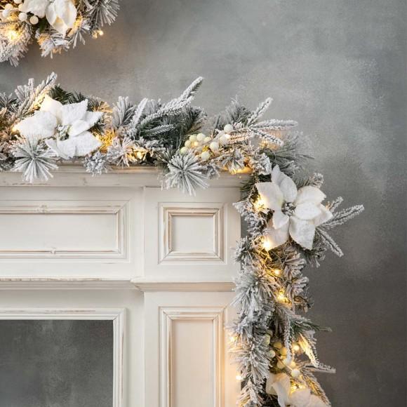 Glitzhome Glitzhome 9ft Pre-Lit Snow Flocked Greenery Pine Poinsettia Christmas Garland With 50 Warm White Lights(Includes Timer)