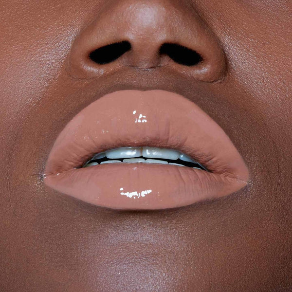 Globe Trotter Maybelline Color Sensational Vivid Hot Lip Lacquer Number 64 Unreal