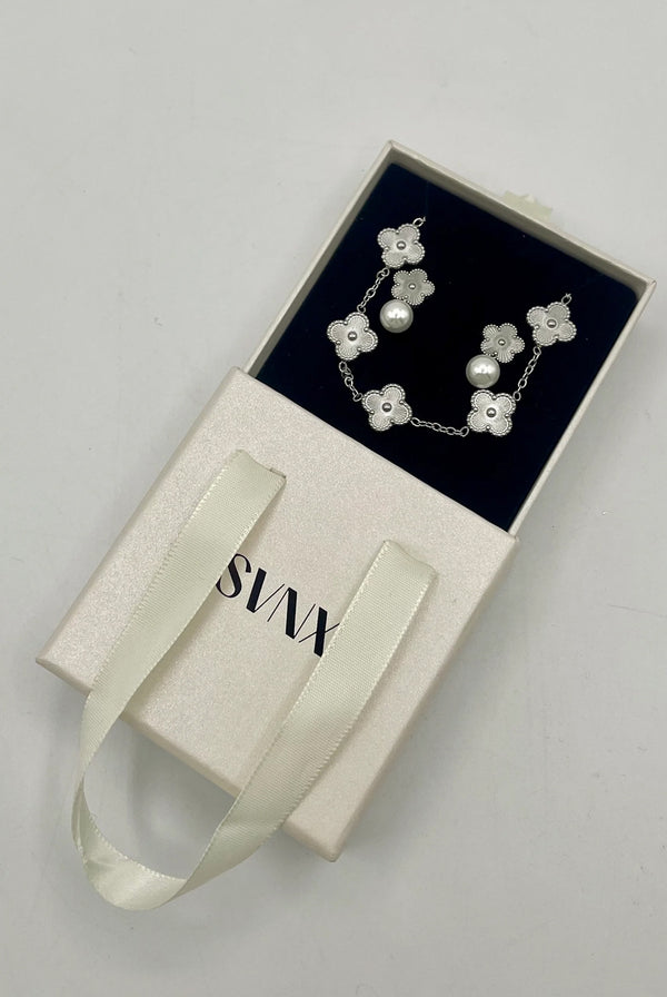 Goddiva Clover Bracelet & Earrings With Pearl Detail In Silver By SVNX