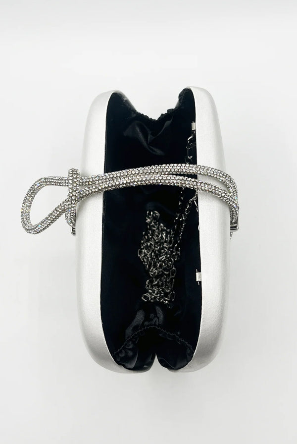 Goddiva Clutch Bag With Crystal Strap Handle In Silver By SVNX