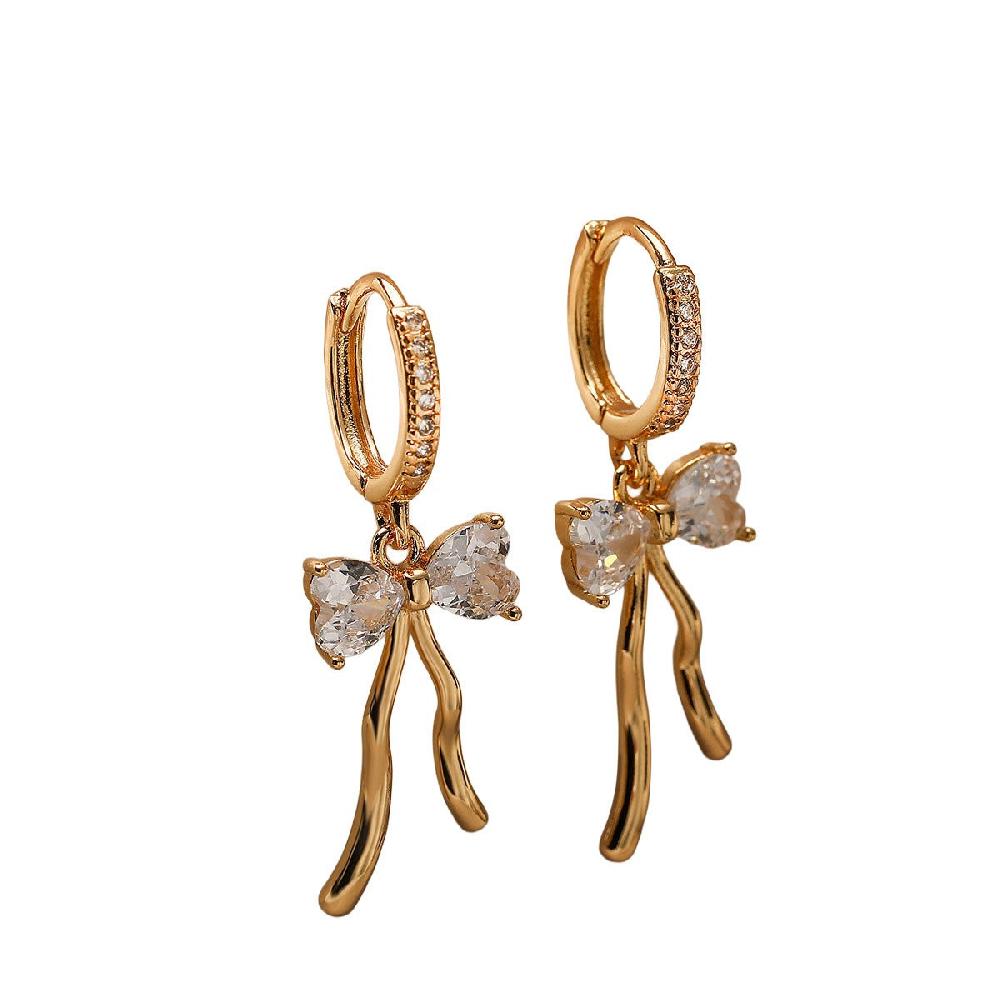 goddiva Cubic Zirconia Bow Pendant Huggie In Gold by Last True Angel