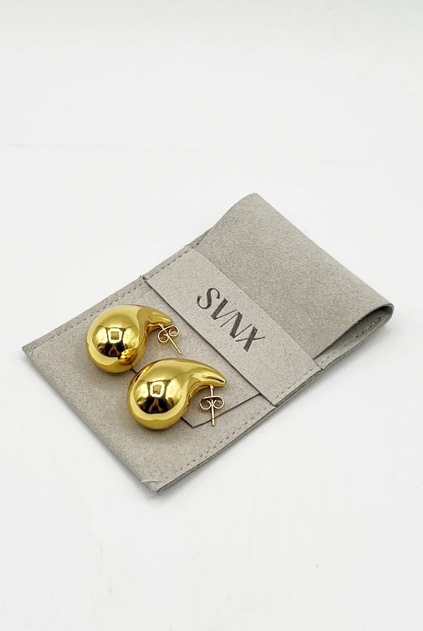 Goddiva Chunky Waterdrop Earrings In Gold By SVNX
