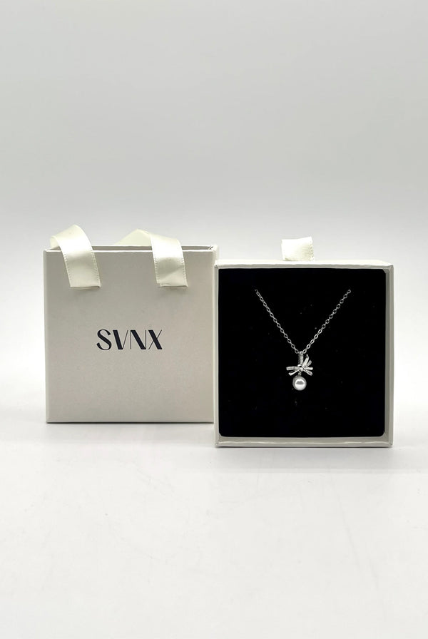 Goddiva Dainty Bow Pearl Pendant Necklace By SVNX