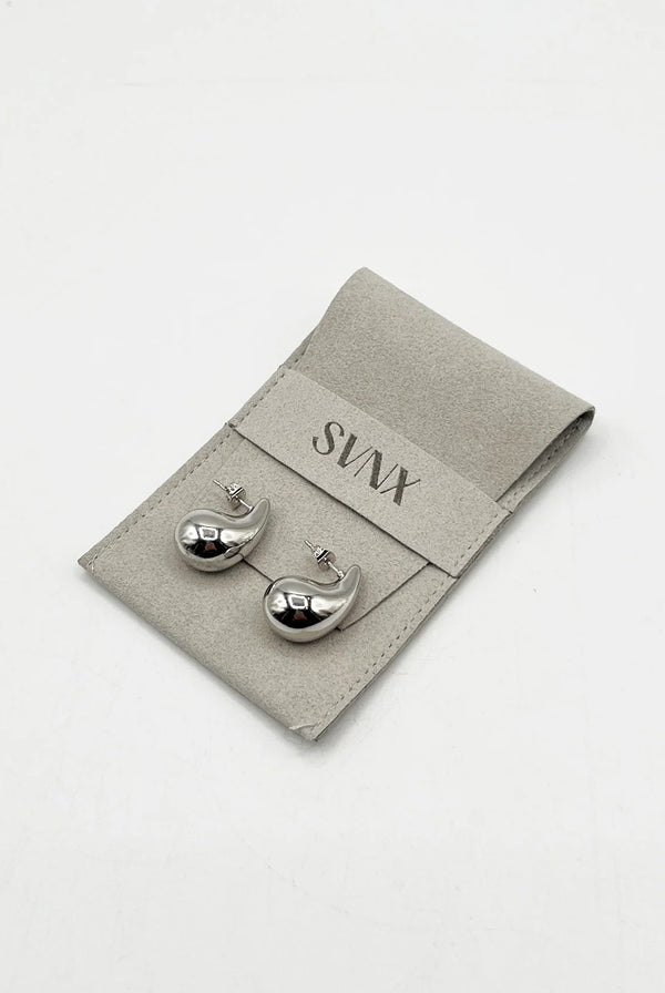 Goddiva Mini Waterdrop Earring In Silver By SVNX