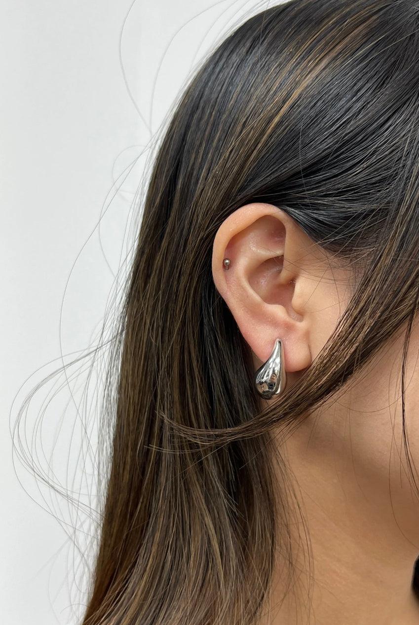 goddiva Mini Waterdrop Earring In Silver by SVNX
