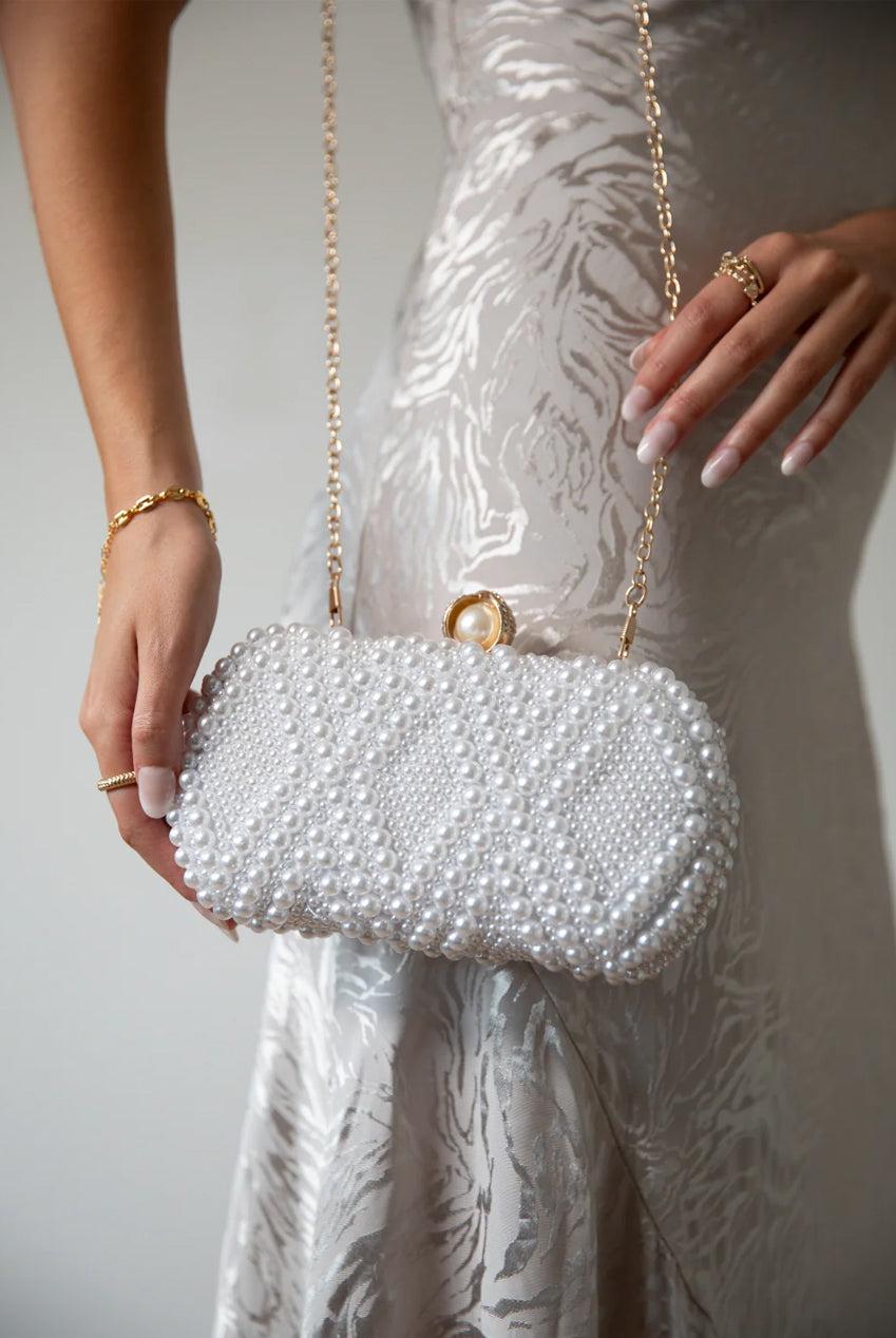 goddiva White Pearl Beaded Clutch Bag by SVNX
