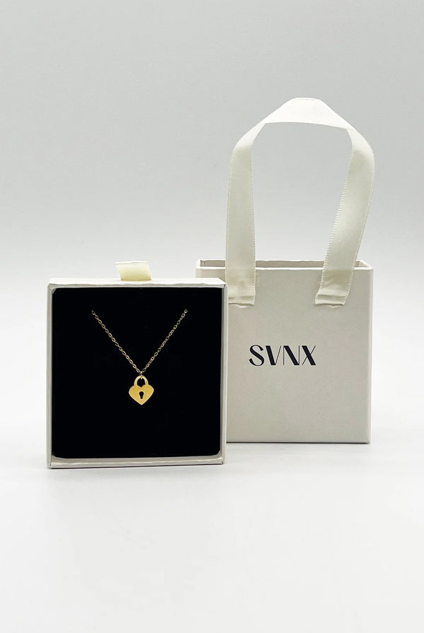 Goddiva Heart Keyhole Pendant Necklace In Gold By SVNX
