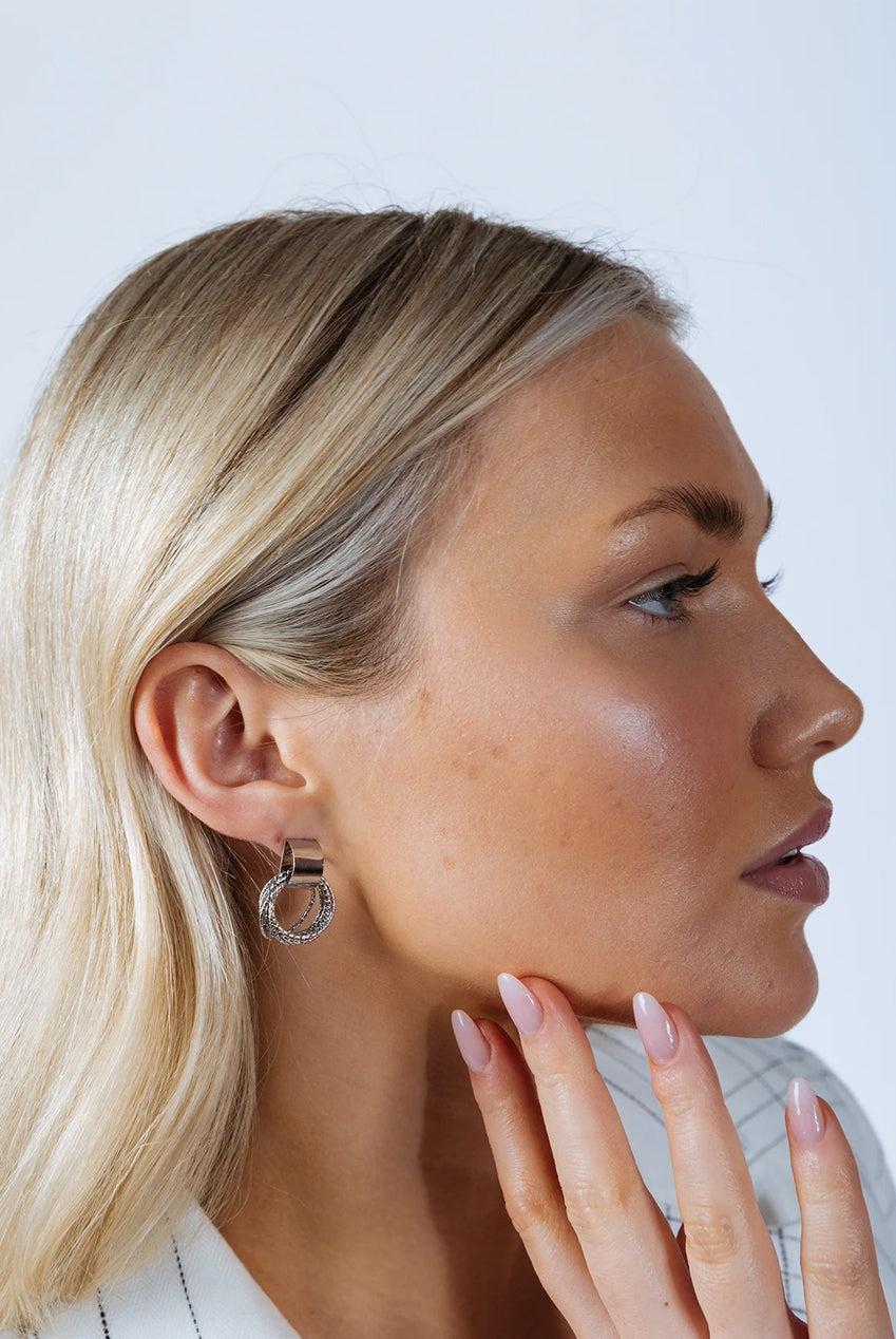 goddiva Multi-Layer Circle Stud Earrings In Silver by SVNX