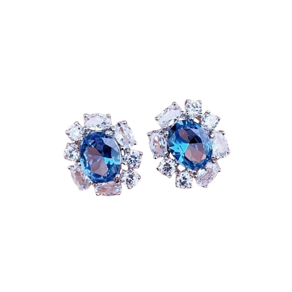 goddiva Oval Cubic Zirconia Surround Earring In Light Blue & Gold by Last True Angel