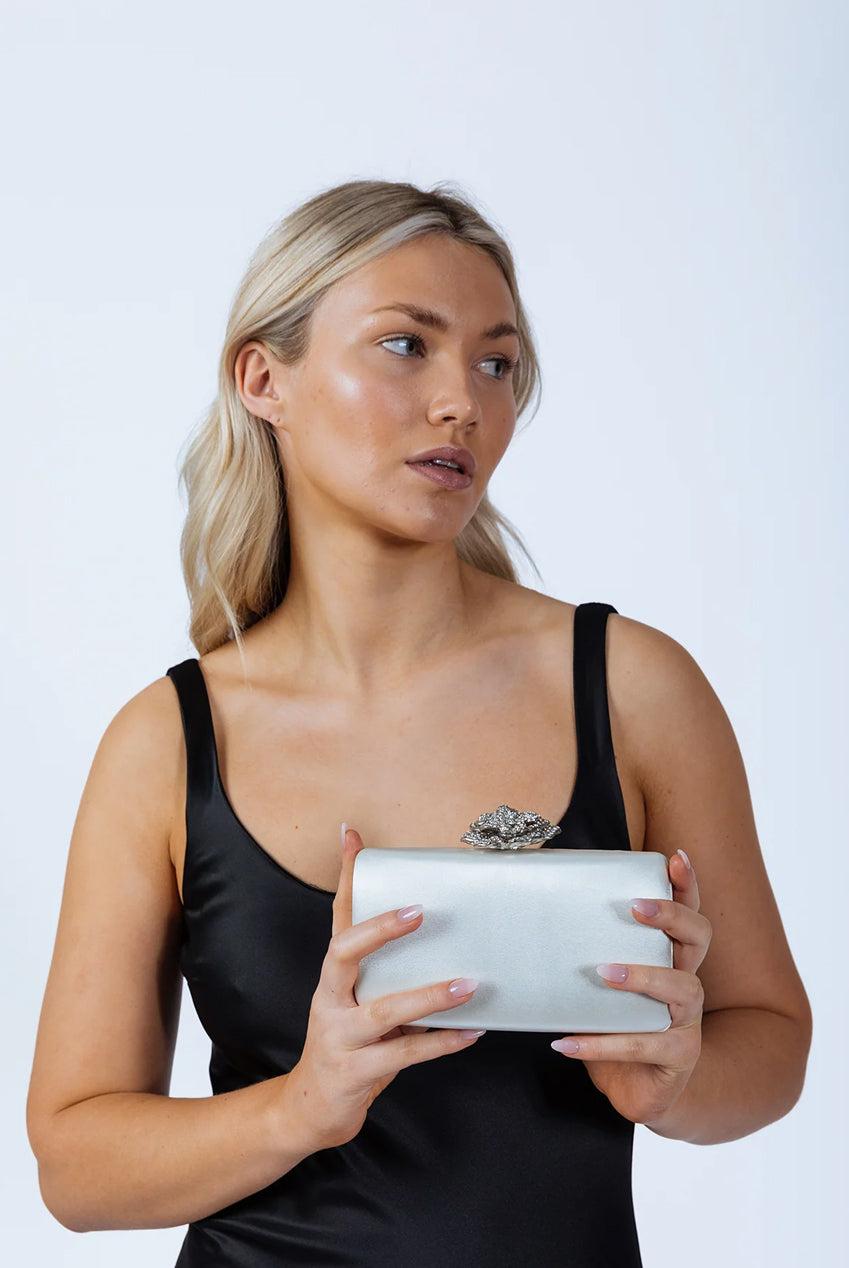 goddiva Satin Clutch Bag With Rose Jewel In Ivory by SVNX