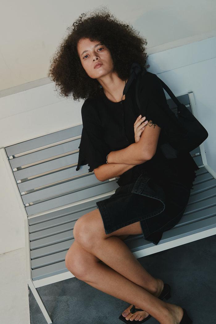 goen.j Asymmetric draped down washed mini denim skirt BLACK