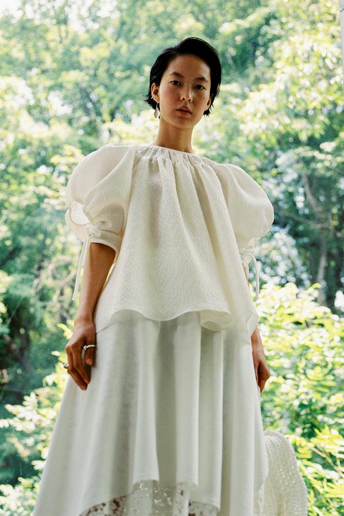 goen.j Balloon sleeved gathered silk-blend matelassé top IVORY