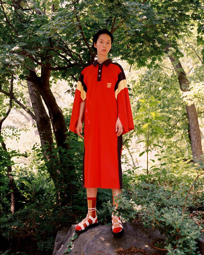 goen.j Color blocked logo-embroidered piqué polo dress RED