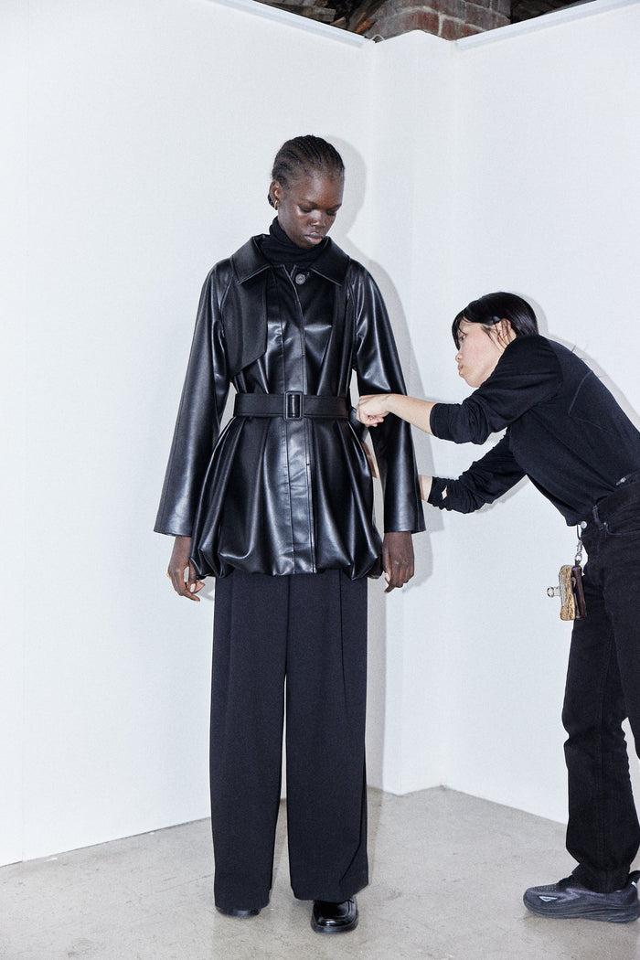 goen.j Exaggerated vegan leather trench jacket BLACK