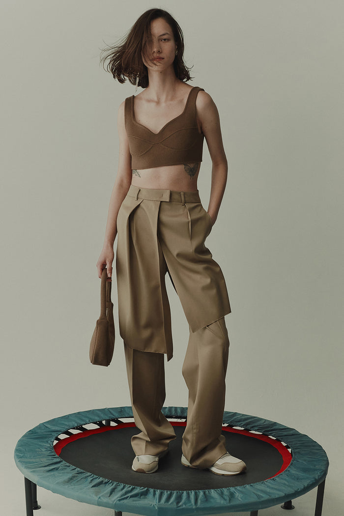 goen.j Front layered wrap shorts paneled wool pants BEIGE