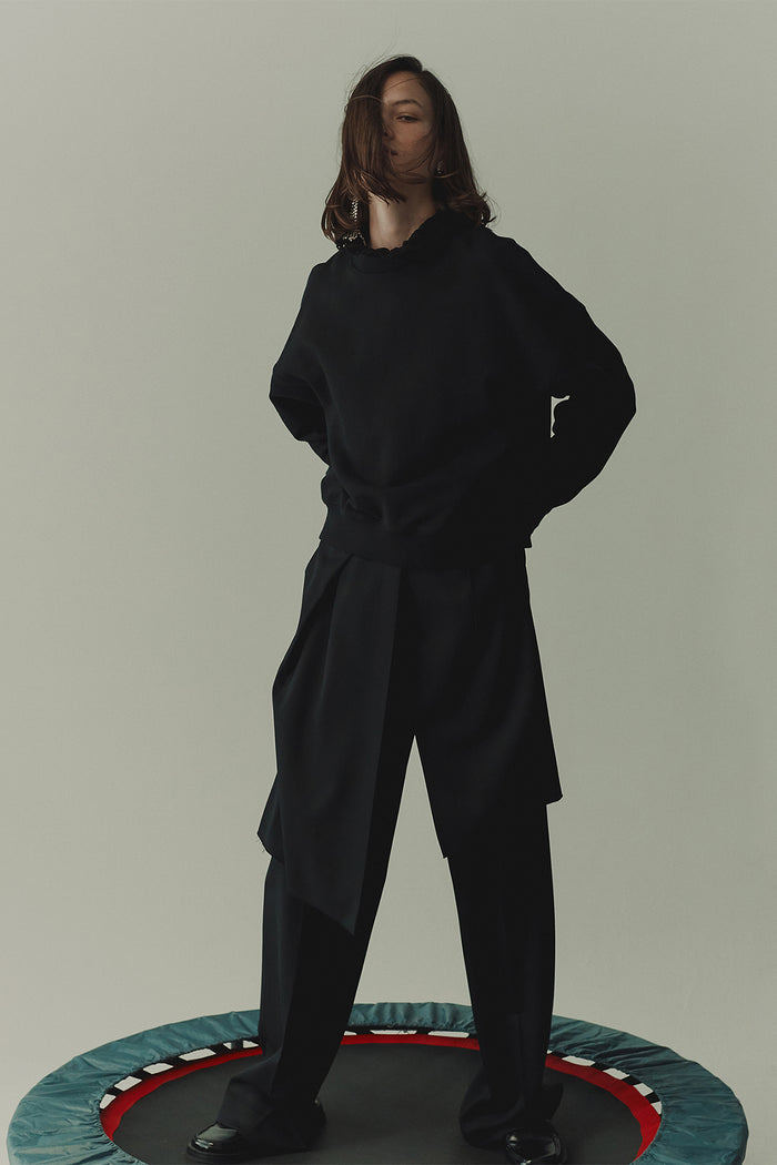 goen.j Front layered wrap shorts paneled wool pants BLACK