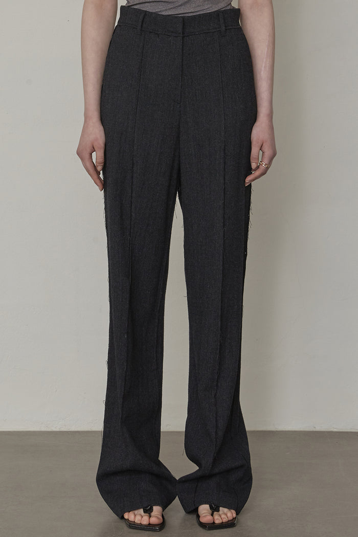 Goen.j Frayed Edge Detail Wool Trousers