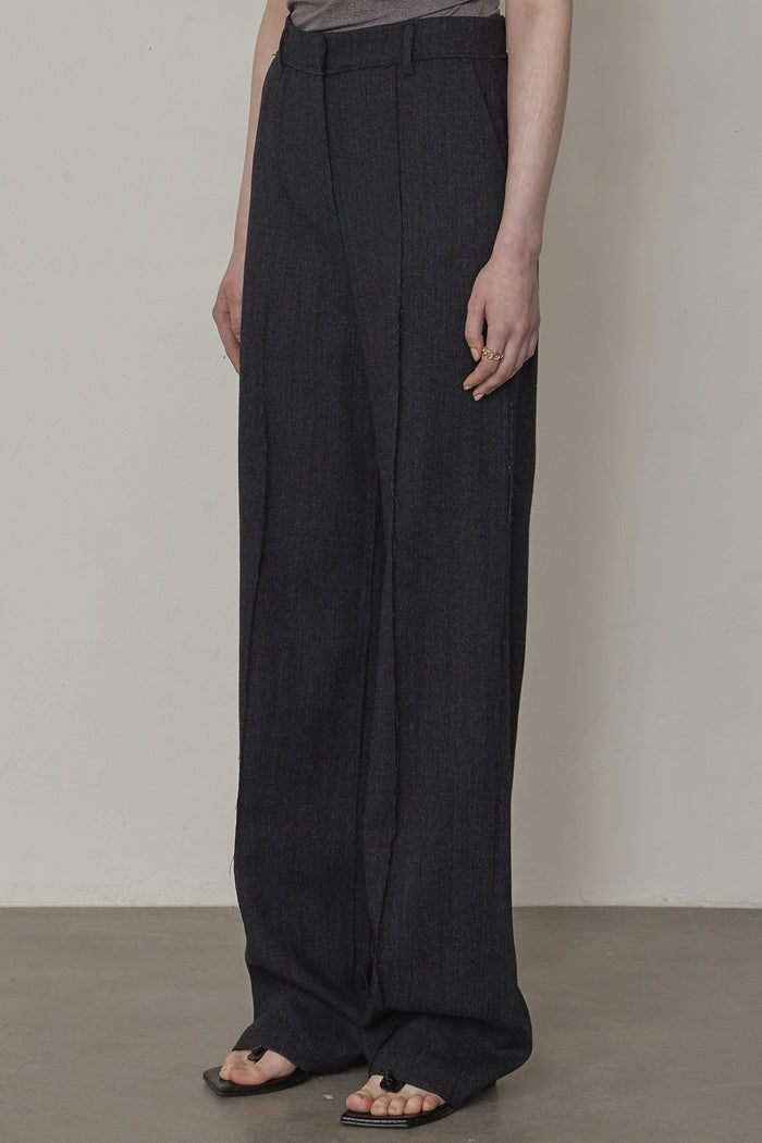 Goen.j Frayed Edge Detail Wool Trousers
