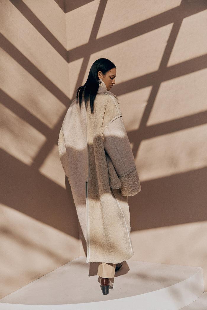 Goen.j Inverted-seam Faux Shearling Patchwork Coat