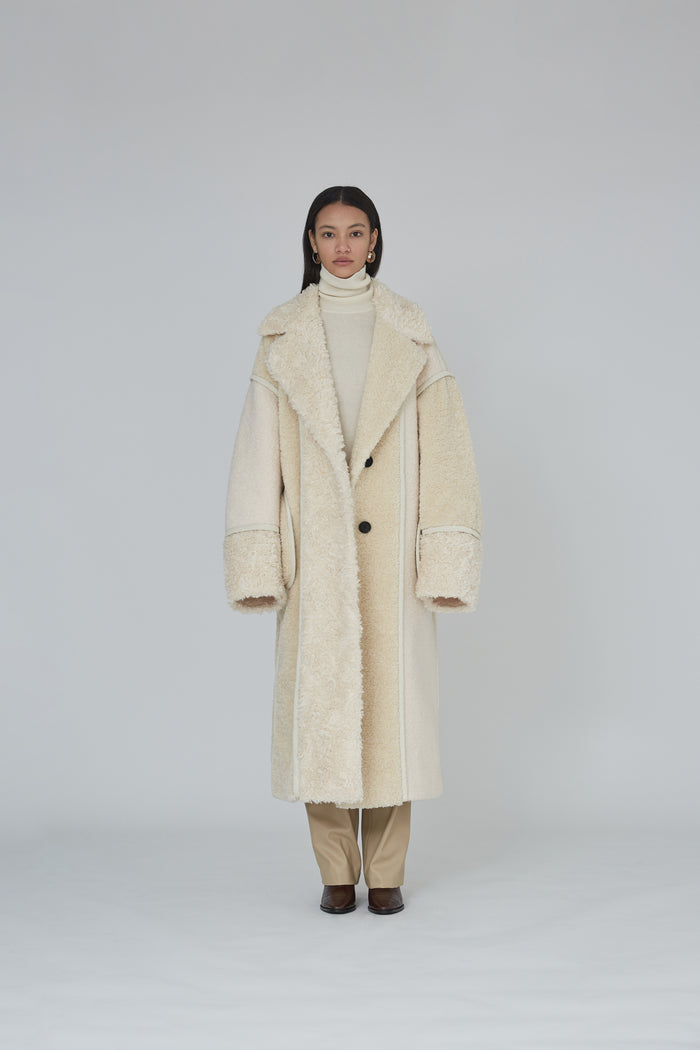 Goen.j Inverted-seam Faux Shearling Patchwork Coat