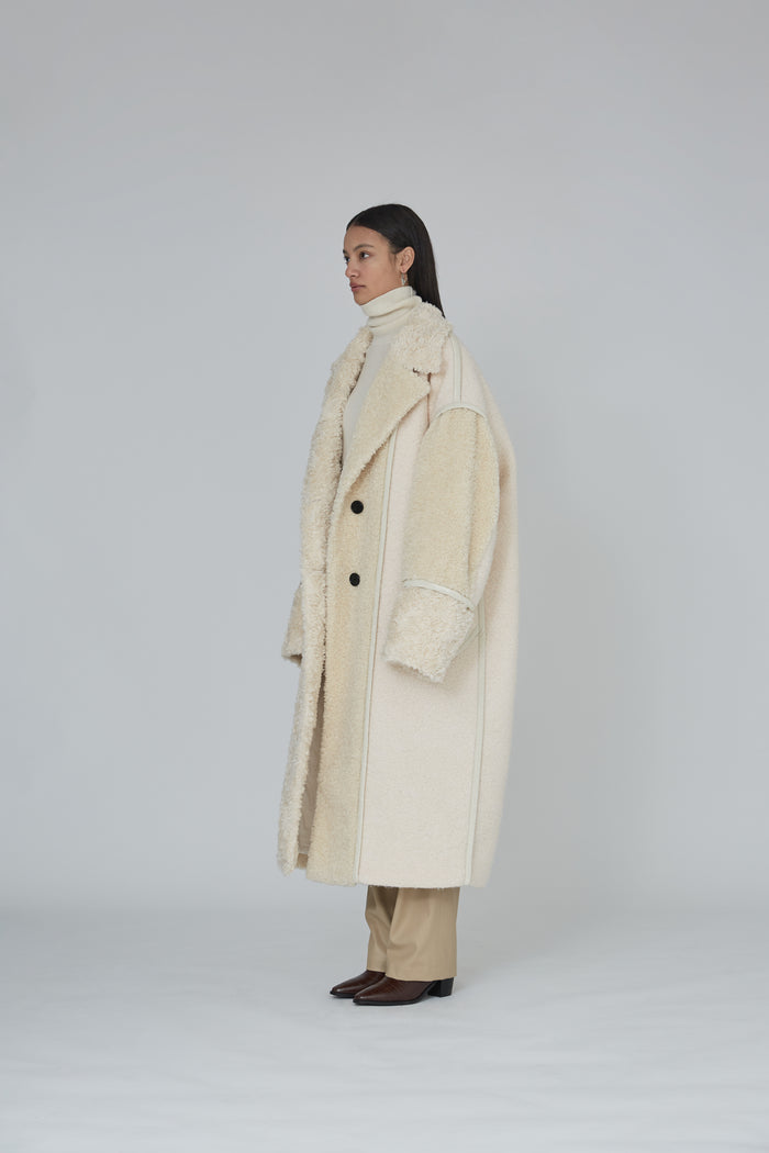 Goen.j Inverted-seam Faux Shearling Patchwork Coat