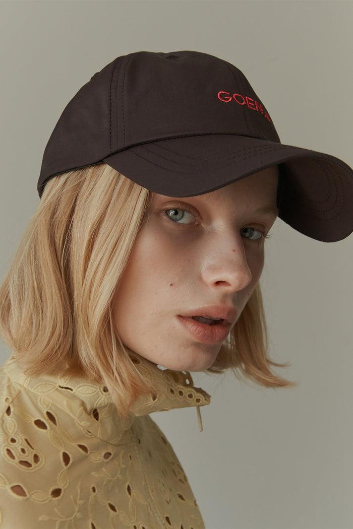 goen.j Logo-embroidered baseball cap Brown