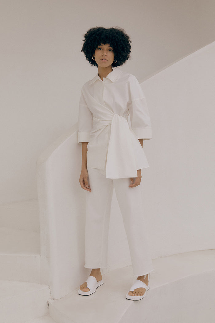 goen.j High-rise cotton wide-leg jeans with lace patch pocket IVORY