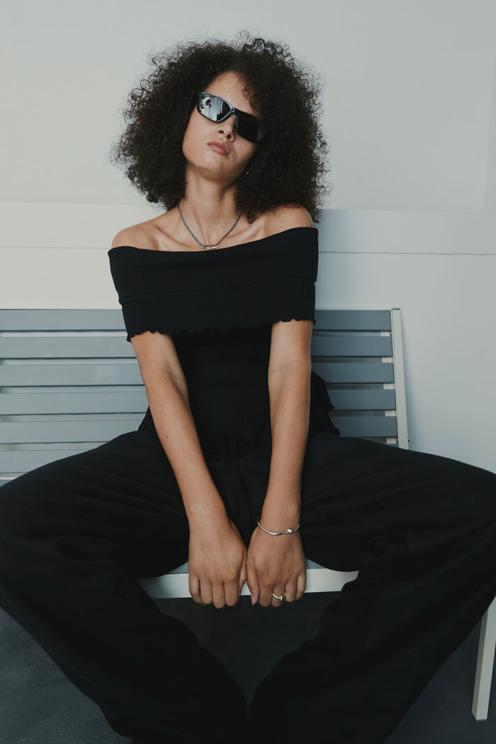 goen.j Off-the-shoulder ruffle-trim ribbed cotton top BLACK