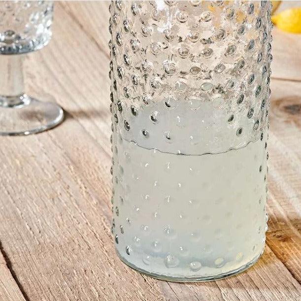 Greige Bottle Shape Carafe With Bobbled Glass Finish