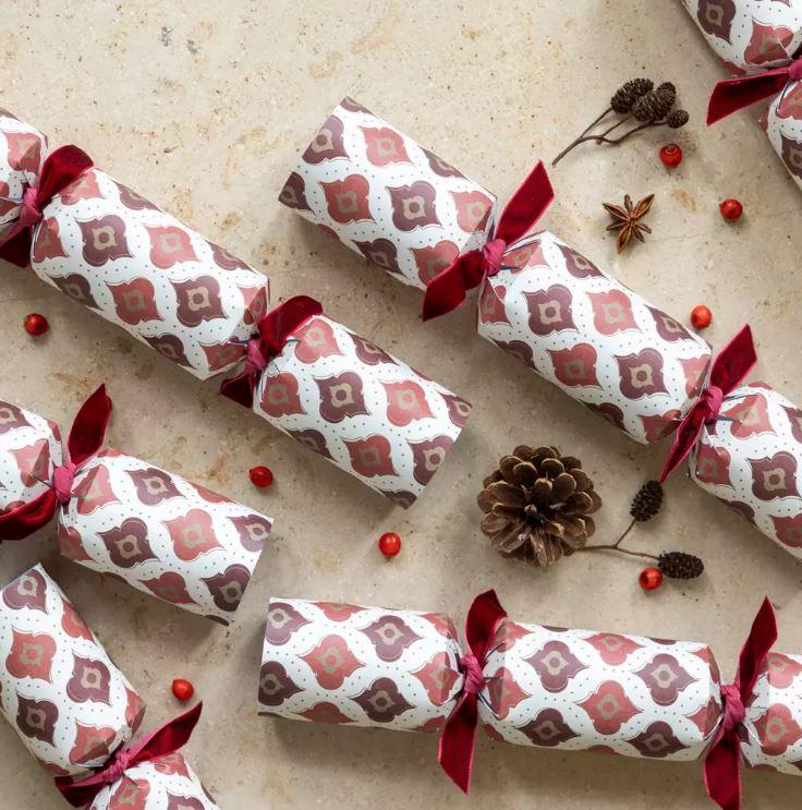 greige Christmas Crackers filled with Wooden Tree Decorations