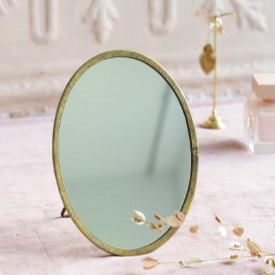 greige Antique Brass Standing Oval Mirror