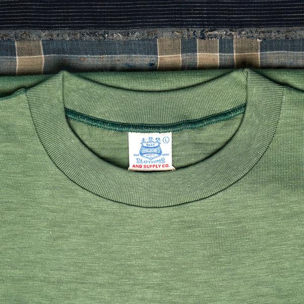 Guilty Parties John Gluckow Standard Pocket Tee - MC Green