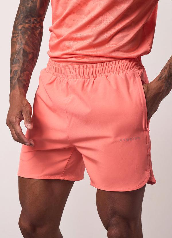 Gym King Relentless 4" Short Coral Punch