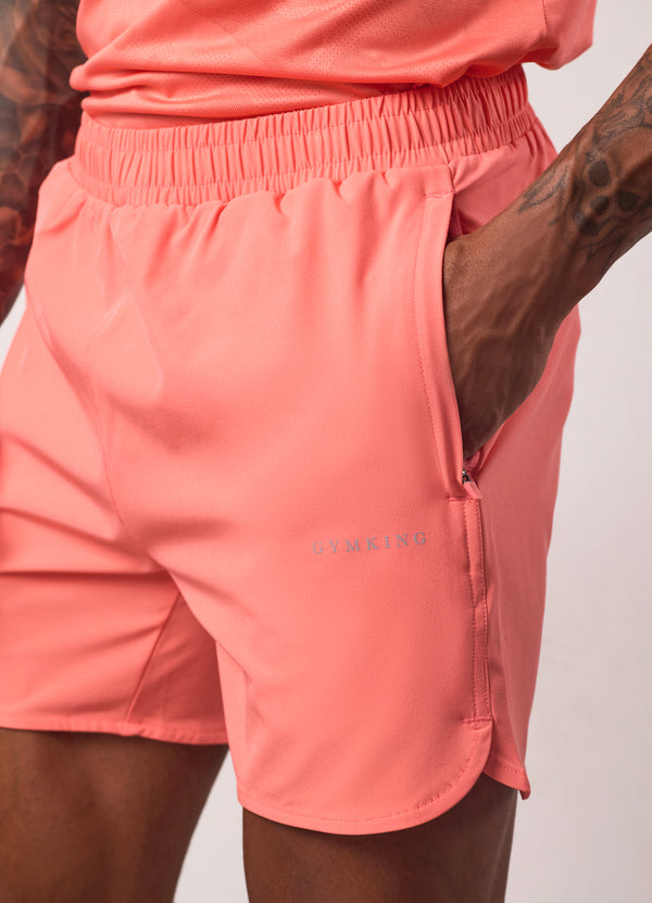 Gym King Relentless 4" Short Coral Punch