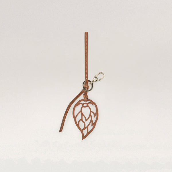 helen kaminski Seed Logo Leather Charm Cotto