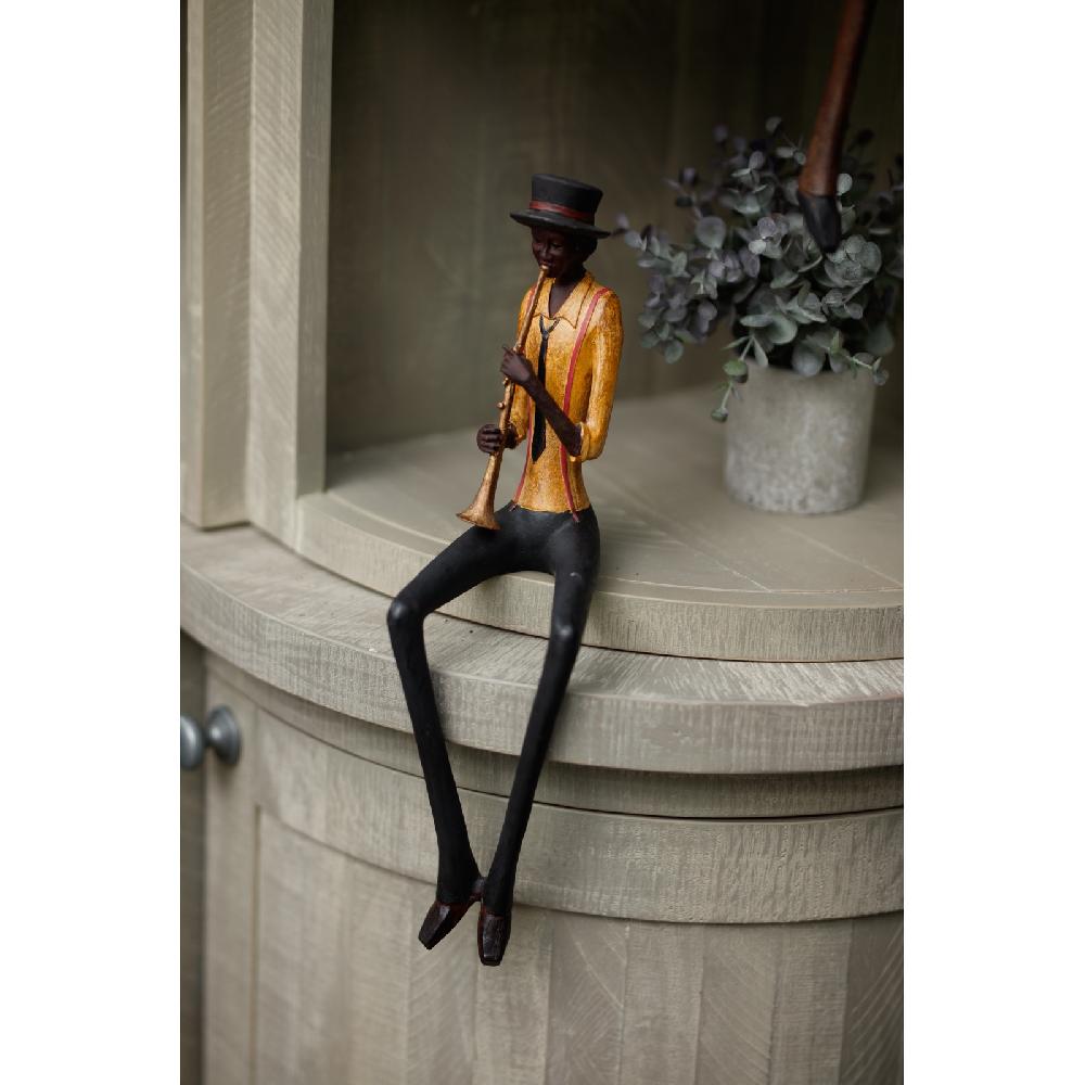 Hill Interiors Sitting Jazz Band Trumpeter