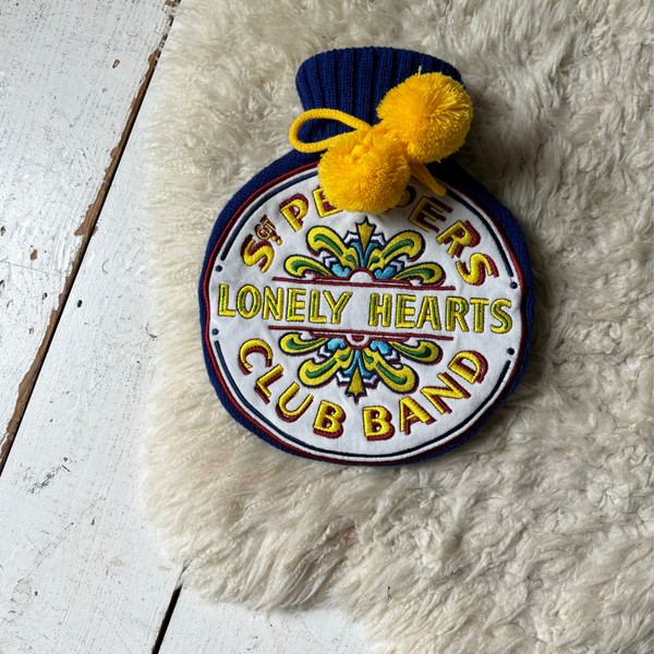 house of disaster The Beatles Sgt. Pepper Hot Water Bottle