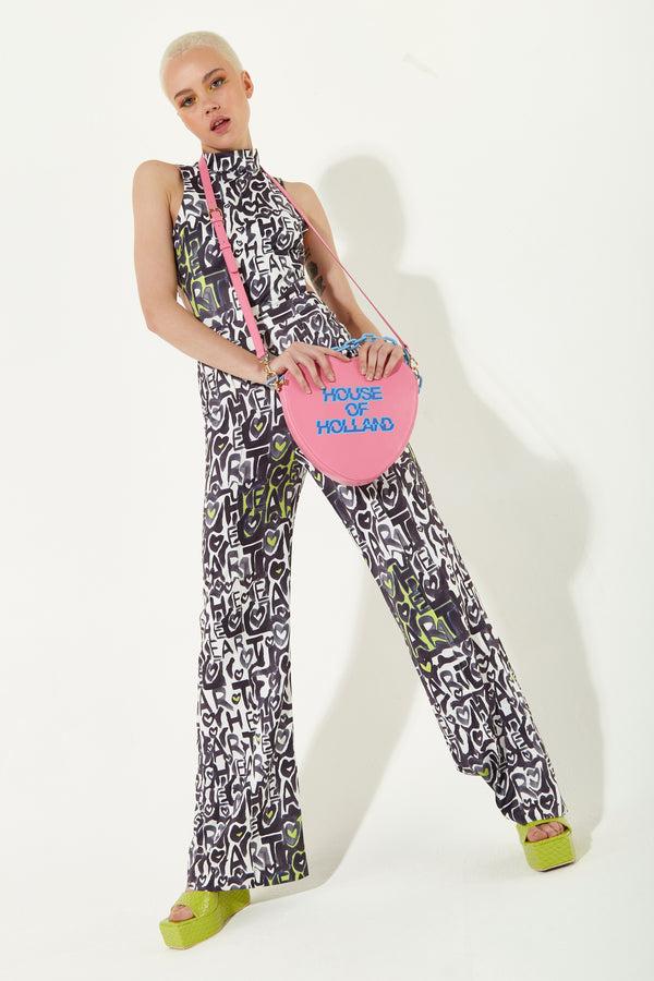 house of holland House Of Holland Heart Shape Cross Body Bag In Pink With A Chain Detail And Printed Logo