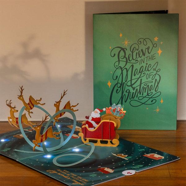 i love pop Magic of Christmas Santa's Sleigh Light-Up Pop-Up Card